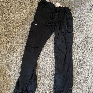 Black Koi scrub bottoms with elastic ties to make joggers